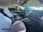 ✅ 2012 Hyundai Veloster w/Red Int • VIN: KMHTC6AD6CU036826 • Lot: 82190224. Wystawiony na Copart z przebiegiem 169 497 mil. Bezpłatny archiwum sprzedaży aukcyjnych z USA i szczegółowy raport historii pojazdu na DreamBid. Zdjęcie 5.