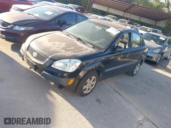 ✅ 2009 Kia Rio LX • VIN: KNADE223596553420 • Lot: 43625728. Wystawiony na IAAI z przebiegiem 180 084 mil. Bezpłatny archiwum sprzedaży aukcyjnych z USA i szczegółowy raport historii pojazdu na DreamBid. Zdjęcie 2.
