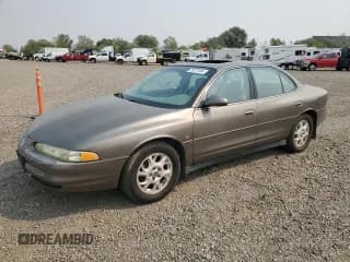 ✅ 2000 Oldsmobile Intrigue GL • VIN: 1G3WS52H4YF210758 • Lot: 70872454. Wystawiony na Copart z przebiegiem 103 298 mil. Bezpłatny archiwum sprzedaży aukcyjnych z USA i szczegółowy raport historii pojazdu na DreamBid. Zdjęcie 1.