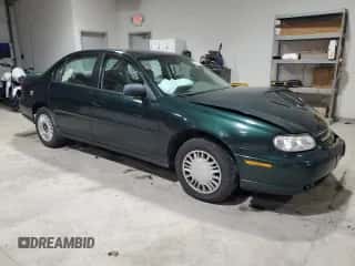 2003 Chevrolet Malibu z VIN 1G1ND52J93M609445, wystawiony jako Copart lot #83435204 z przebiegiem 132 929 mil mil oraz Szkoda całkowita • Salvage title. Historia ofert i sprzedaży dostępna na DreamBid. Obrazek 4.