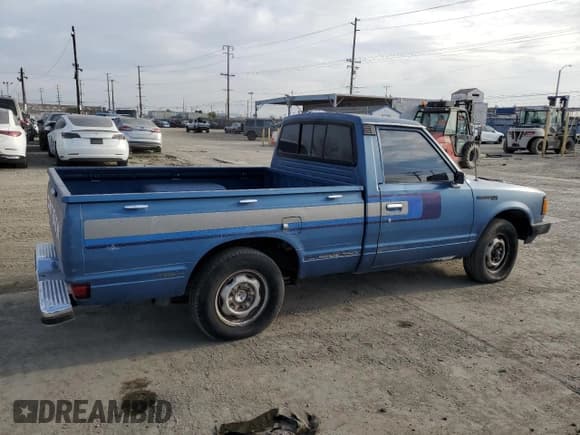 ✅ 1982 Datsun 720 • VIN: JN6SD01SXCW102918 • Лот: 51125715. Опубликован ранее на Copart с пробегом 226 428 миль. Бесплатный доступ к архиву аукционных продаж из США и подробный отчёт об истории автомобиля на DreamBid. Изображение 3.