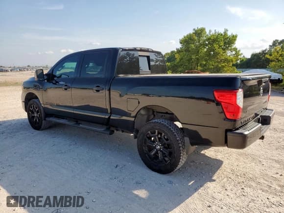 ✅ 2018 Nissan Titan Platinum Reserve • VIN: 1N6BA1F43JN525223 • Lot: 67204495. Listed on Copart with 112,352 mi. Free auction sales archive from the USA and detailed vehicle history report at DreamBid. Image 2.