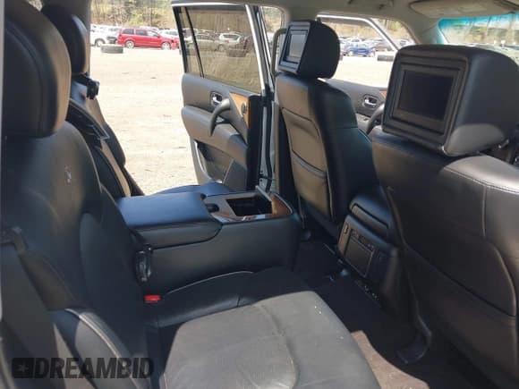 ✅ 2013 Infiniti QX56 • VIN: JN8AZ2NE5D9042826 • Lot: 42073857. Listed on IAAI with 77,960 mi. Free auction sales archive from the USA and detailed vehicle history report at DreamBid. Image 8.