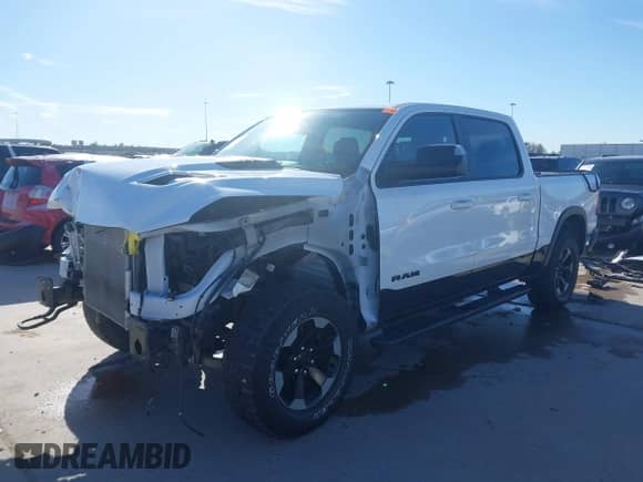2020 Ram 1500 Rebel с VIN 1C6RRELT5LN302544, выставлен на аукционе IAAI как лот 41702948 с пробегом 56 932 миль миль и . История ставок и продаж доступна на DreamBid. Изображение 19.