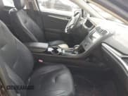 ✅ 2014 Ford Fusion Titanium Hybrid • VIN: 3FA6P0RUXER191158 • Lot: 42815287. Wystawiony na IAAI z przebiegiem 162 415 mil. Bezpłatny archiwum sprzedaży aukcyjnych z USA i szczegółowy raport historii pojazdu na DreamBid. Zdjęcie 5.