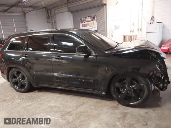 ✅ 2016 Jeep Grand Cherokee Overland • VIN: 1C4RJFCT3GC450537 • Lot: 41556999. Listed on IAAI with 73,753 mi. Free auction sales archive from the USA and detailed vehicle history report at DreamBid. Image 14.