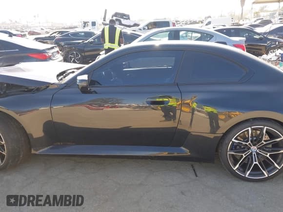 ✅ 2023 BMW M2 • VIN: 3MF13DM05P8D30520 • Lot: 42264719. Listed on IAAI with 23,612 mi. Free auction sales archive from the USA and detailed vehicle history report at DreamBid. Image 14.