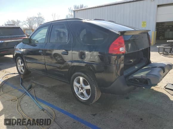 ✅ 2003 Pontiac Aztek • VIN: 3G7DA03E73S556503 • Lot: 49492825. Listed on Copart with 142,654 mi. Free auction sales archive from the USA and detailed vehicle history report at DreamBid. Image 2.