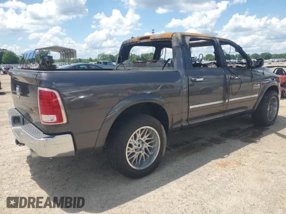 ✅ 2015 Ram 1500 Laramie • VIN: 1C6RR6NM8FS592702 • Lot: 56847745. Listed on Copart with Not provided. Free auction sales archive from the USA and detailed vehicle history report at DreamBid. Image 3.