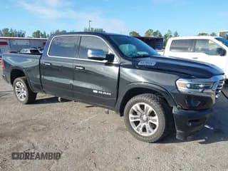 ✅ 2021 Ram 1500 Longhorn • VIN: 1C6SRFST3MN657898 • Lot: 43647983. Listed on IAAI with 206,104 mi. Free auction sales archive from the USA and detailed vehicle history report at DreamBid. Image 1.