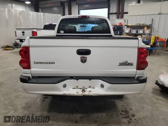 2008 Dodge Dakota Bighorn/Lonestar with VIN 1D7HE38K88S590577, listed as a Copart auction lot 73517754 with 128,163 mi miles and Salvage title. Bid and sale history available at DreamBid. Image 6.