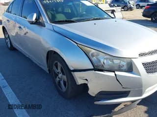 ✅ 2014 Chevrolet Cruze 1LT • VIN: 1G1PC5SB2E7258013 • Lot: 43417395. Listed on IAAI with 219,609 mi. Free auction sales archive from the USA and detailed vehicle history report at DreamBid. Image 6.