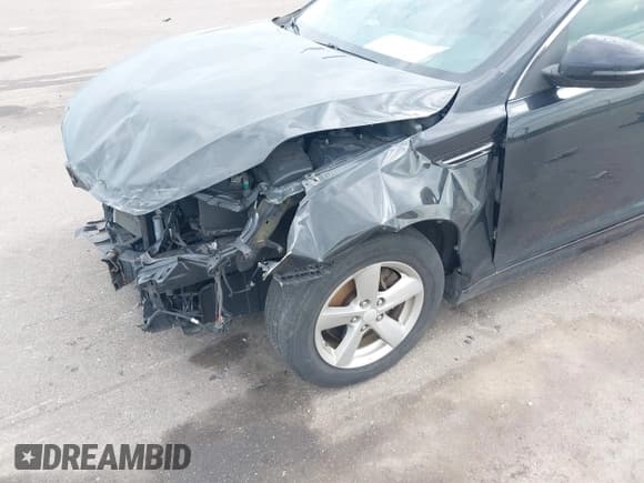 ✅ 2014 Kia Optima LX • VIN: 5XXGM4A7XEG340798 • Lot: 43241109. Listed on IAAI with 113,855 mi. Free auction sales archive from the USA and detailed vehicle history report at DreamBid. Image 6.