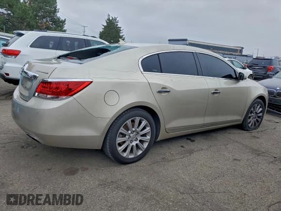 ✅ 2013 Buick LaCrosse Leather • VIN: 1G4GC5E34DF230936 • Lot: 93876255. Listed on Copart with 143,590 mi. Free auction sales archive from the USA and detailed vehicle history report at DreamBid. Image 3.