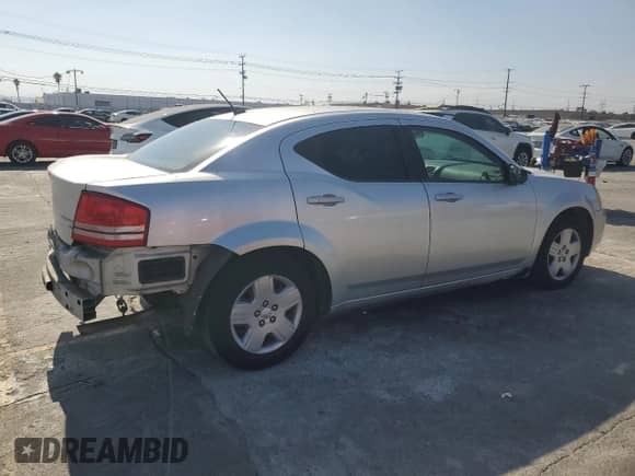 2010 Dodge Avenger SXT с VIN 1B3CC4FB7AN173069, выставлен на аукционе Copart как лот 72399094 с пробегом 170 620 миль миль и Списание • Salvage title. История ставок и продаж доступна на DreamBid. Изображение 3.