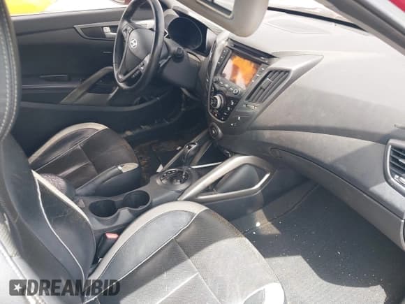 ✅ 2013 Hyundai Veloster Turbo • VIN: KMHTC6AE2DU129756 • Lot: 43147167. Listed on IAAI with 88,763 mi. Free auction sales archive from the USA and detailed vehicle history report at DreamBid. Image 5.