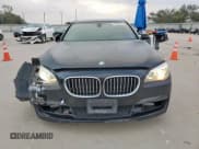 ✅ 2014 BMW 7 Series 740i • VIN: WBAYA6C5XED144517 • Lot: 90255015. Wystawiony na Copart z przebiegiem 178 636 mil. Bezpłatny archiwum sprzedaży aukcyjnych z USA i szczegółowy raport historii pojazdu na DreamBid. Zdjęcie 5.