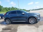 ✅ 2021 Cadillac XT4 FWD Premium Luxury • VIN: 1GYFZCR42MF007617 • Лот: 42437974. Опубликован ранее на IAAI с пробегом 126 071 миль. Бесплатный доступ к архиву аукционных продаж из США и подробный отчёт об истории автомобиля на DreamBid. Изображение 13.