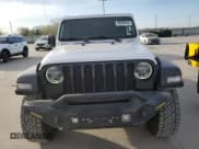 ✅ 2021 Jeep Wrangler Unlimited Islander • VIN: 1C4HJXDN1MW589657 • Лот: 49340445. Опубликован ранее на Copart с пробегом 93 619 миль. Бесплатный доступ к архиву аукционных продаж из США и подробный отчёт об истории автомобиля на DreamBid. Изображение 5.
