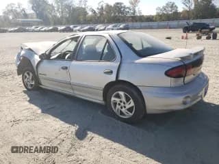✅ 2001 Pontiac Sunfire SE • VIN: 1G2JB524817417326 • Лот: 78038904. Опубликован ранее на Copart с пробегом 128 860 миль. Бесплатный доступ к архиву аукционных продаж из США и подробный отчёт об истории автомобиля на DreamBid. Изображение 2.