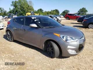 2016 Hyundai Veloster z VIN KMHTC6AD7GU248608, wystawiony jako Copart lot #65809693 z przebiegiem 104 784 mil mil oraz . Historia ofert i sprzedaży dostępna na DreamBid. Obrazek 4.