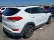 2017 Hyundai Tucson Sport with VIN KM8J33A2XHU548973, listed as a IAAI auction lot 43339444 with 103,873 mi miles and . Bid and sale history available at DreamBid. Image 4.