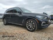 ✅ 2021 BMW X5 xDrive45e • VIN: 5UXTA6C04M9H58063 • Lot: 53128655. Listed on Copart with 56,558 mi. Free auction sales archive from the USA and detailed vehicle history report at DreamBid. Image 4.