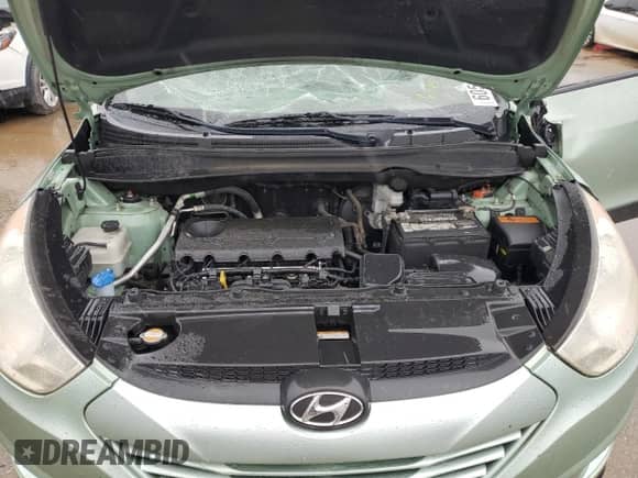 2013 Hyundai Tucson GLS z VIN KM8JU3AC4DU546815, wystawiony jako Copart lot #60543454 z przebiegiem 158 613 mil mil oraz Szkoda całkowita • Salvage title. Historia ofert i sprzedaży dostępna na DreamBid. Obrazek 12.