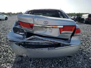 2006 Hyundai Azera SE с VIN KMHFC46F96A037972, выставлен на аукционе Copart как лот 61035765 с пробегом 140 857 миль миль и Списание • Salvage title. История ставок и продаж доступна на DreamBid. Изображение 6.