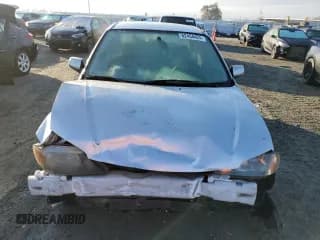 ✅ 2003 Mazda Protege DX • VIN: JM1BJ225130148222 • Lot: 82454424. Wystawiony na Copart z przebiegiem 94 957 mil. Bezpłatny archiwum sprzedaży aukcyjnych z USA i szczegółowy raport historii pojazdu na DreamBid. Zdjęcie 5.