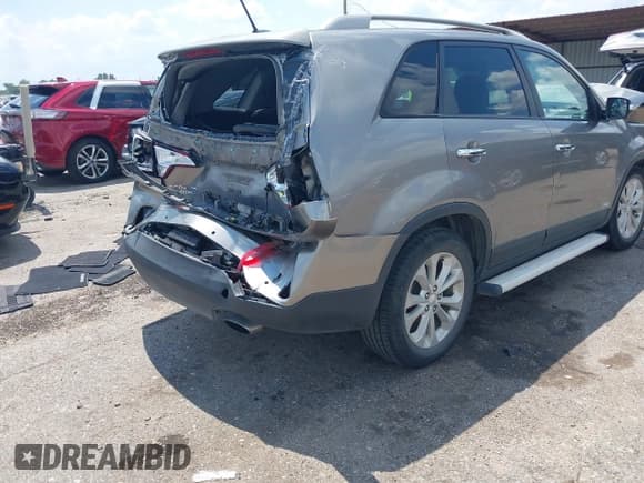 ✅ 2015 Kia Sorento EX • VIN: 5XYKUDA72FG625714 • Лот: 43125200. Опубликован ранее на IAAI с пробегом 119 896 миль. Бесплатный доступ к архиву аукционных продаж из США и подробный отчёт об истории автомобиля на DreamBid. Изображение 4.