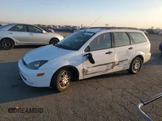 ✅ 2003 Ford Focus • VIN: 1FAHP36Z53W254395 • Lot: 73870944. Listed on Copart with 82,010 mi. Free auction sales archive from the USA and detailed vehicle history report at DreamBid. Image 1.