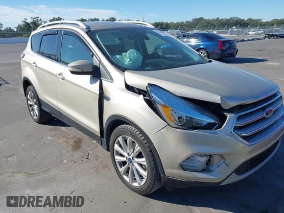✅ 2017 Ford Escape Titanium • VIN: 1FMCU0JD6HUD58495 • Lot: 43617499. Wystawiony na IAAI z przebiegiem 118 379 mil. Bezpłatny archiwum sprzedaży aukcyjnych z USA i szczegółowy raport historii pojazdu na DreamBid. Zdjęcie 6.