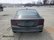 ✅ 2015 Audi RS 7 • VIN: WUAW2CFC0FN900483 • Лот: 47700525. Опубликован ранее на Copart с пробегом 107 260 миль. Бесплатный доступ к архиву аукционных продаж из США и подробный отчёт об истории автомобиля на DreamBid. Изображение 6.