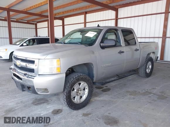 ✅ 2010 Chevrolet Silverado 1500 LT • VIN: 3GCRKSE31AG258718 • Лот: 42061306. Опубликован ранее на IAAI с пробегом 220 656 миль. Бесплатный доступ к архиву аукционных продаж из США и подробный отчёт об истории автомобиля на DreamBid. Изображение 2.