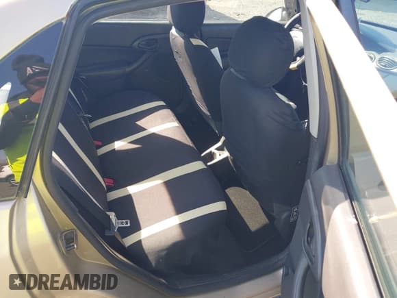 ✅ 2002 Ford Focus LX • VIN: 1FAFP33P42W289681 • Lot: 41989506. Wystawiony na IAAI z przebiegiem 128 070 mil. Bezpłatny archiwum sprzedaży aukcyjnych z USA i szczegółowy raport historii pojazdu na DreamBid. Zdjęcie 8.