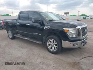 ✅ 2017 Nissan Titan SV • VIN: 1N6AA1F20HN552819 • Lot: 42005141. Listed on IAAI with 139,799 mi. Free auction sales archive from the USA and detailed vehicle history report at DreamBid. Image 1.