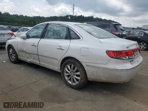 2007 Hyundai Azera SE с VIN KMHFC46F47A216700, выставлен на аукционе Copart как лот 64715524 с пробегом 117 819 миль миль и Списание • Salvage title. История ставок и продаж доступна на DreamBid. Изображение 2.