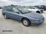 ✅ 1999 Ford Taurus SE • VIN: 1FAFP58U6XG294960 • Лот: 81061404. Опубликован ранее на Copart с пробегом 143 199 миль. Бесплатный доступ к архиву аукционных продаж из США и подробный отчёт об истории автомобиля на DreamBid. Изображение 4.