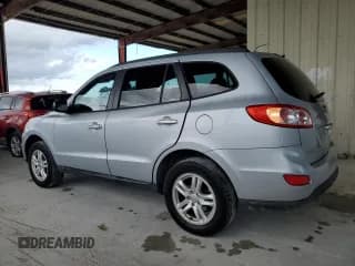 ✅ 2010 Hyundai Santa Fe GLS • VIN: 5NMSG3AB0AH344550 • Lot: 77281624. Listed on Copart with 128,411 mi. Free auction sales archive from the USA and detailed vehicle history report at DreamBid. Image 2.