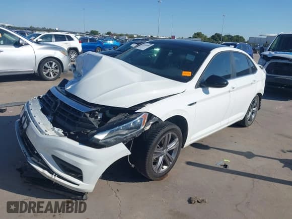 ✅ 2019 Volkswagen Jetta S • VIN: 3VWC57BU8KM061410 • Lot: 43436980. Wystawiony na IAAI z przebiegiem 93 031 mil. Bezpłatny archiwum sprzedaży aukcyjnych z USA i szczegółowy raport historii pojazdu na DreamBid. Zdjęcie 18.