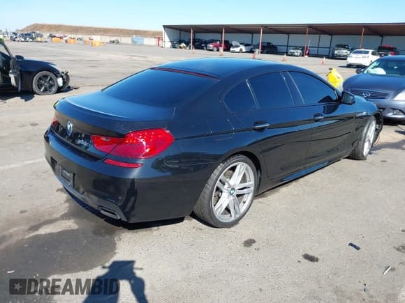 ✅ 2015 BMW 6 Series 650i • VIN: WBA6B2C57FD799149 • Lot: 43461719. Wystawiony na IAAI z przebiegiem 97 464 mil. Bezpłatny archiwum sprzedaży aukcyjnych z USA i szczegółowy raport historii pojazdu na DreamBid. Zdjęcie 4.