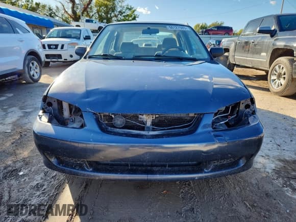 ✅ 1999 Mazda Protege DX • VIN: JM1BJ2228X0164462 • Lot: 90127985. Wystawiony na Copart z przebiegiem 114 178 mil. Bezpłatny archiwum sprzedaży aukcyjnych z USA i szczegółowy raport historii pojazdu na DreamBid. Zdjęcie 5.