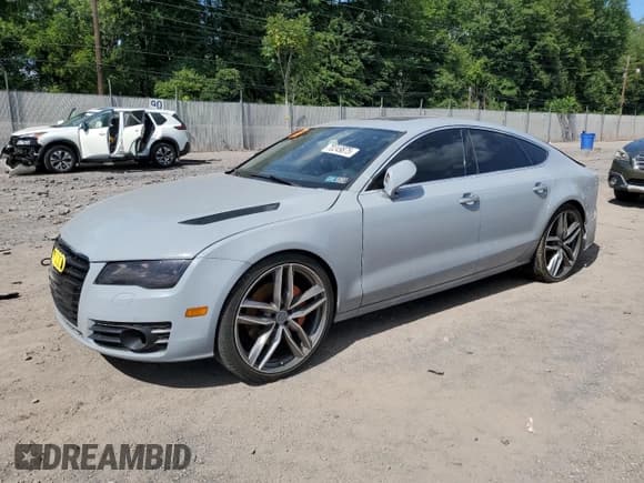 ✅ 2013 Audi A7 Premium Plus • VIN: WAUYGAFC7DN081560 • Лот: 70249875. Опубликован ранее на Copart с пробегом Не указан. Бесплатный доступ к архиву аукционных продаж из США и подробный отчёт об истории автомобиля на DreamBid. Изображение 1.