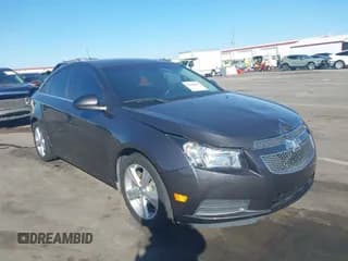 ✅ 2014 Chevrolet Cruze 2LT • VIN: 1G1PE5SB5E7311717 • Lot: 43496848. Listed on IAAI with 121,238 mi. Free auction sales archive from the USA and detailed vehicle history report at DreamBid. Image 1.
