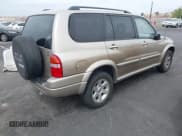 ✅ 2003 Suzuki XL7 Touring • VIN: JS3TX92V234105188 • Lot: 43139033. Wystawiony na IAAI z przebiegiem 106 722 mil. Bezpłatny archiwum sprzedaży aukcyjnych z USA i szczegółowy raport historii pojazdu na DreamBid. Zdjęcie 4.