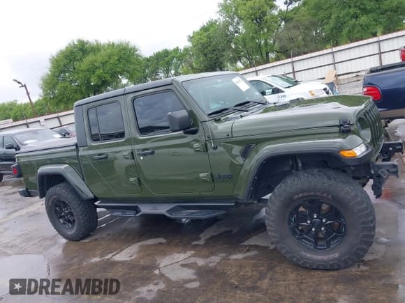 ✅ 2021 Jeep Gladiator Willys • VIN: 1C6HJTAG1ML568394 • Lot: 41895672. Listed on IAAI with 59,015 mi. Free auction sales archive from the USA and detailed vehicle history report at DreamBid. Image 13.