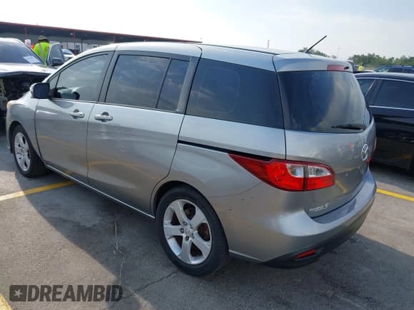 ✅ 2014 Mazda 5 Sport • VIN: JM1CW2BL9E0165101 • Lot: 42280068. Listed on IAAI with 147,336 mi. Free auction sales archive from the USA and detailed vehicle history report at DreamBid. Image 3.