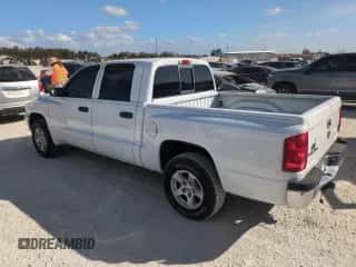 2006 Dodge Dakota SLT z VIN 1D7HE48NX6S636343, wystawiony jako Copart lot #77351904 z przebiegiem Nie podano mil oraz Szkoda całkowita • Salvage title. Historia ofert i sprzedaży dostępna na DreamBid. Obrazek 2.
