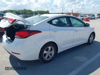 ✅ 2014 Hyundai Elantra SE • VIN: 5NPDH4AE9EH524270 • Lot: 43383212. Listed on IAAI with 98,555 mi. Free auction sales archive from the USA and detailed vehicle history report at DreamBid. Image 4.